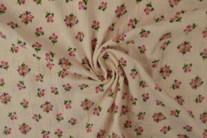 hydrofiel stof champagne met roze roosjes