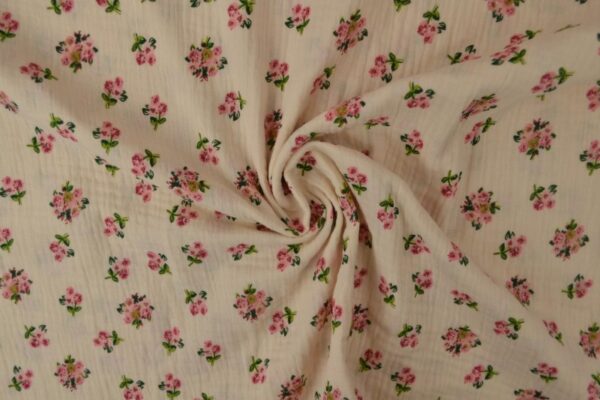 hydrofiel stof champagne met roze roosjes