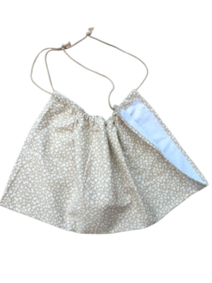 Beige weegdoek met witte bleometjes